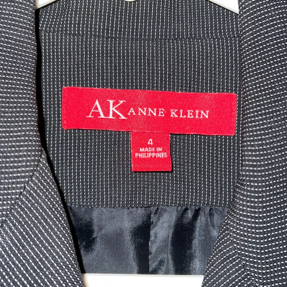Anne Klein black with tiny white polka dots.